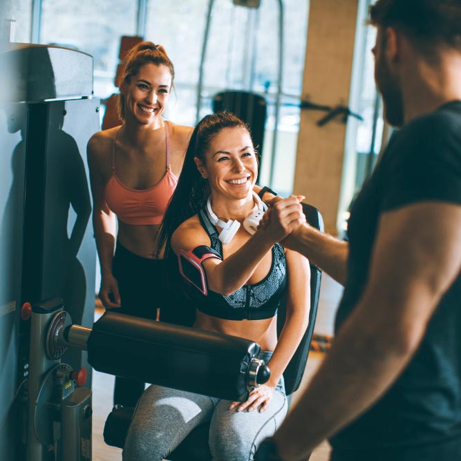 Photo of gym members working out