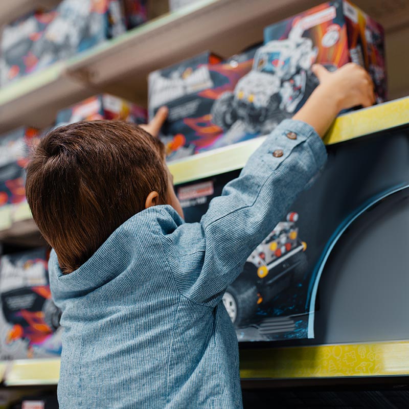 Photo of a child in a Northwest Arkansas toy store