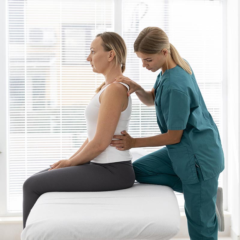 Photo of a patient and chiropractor 